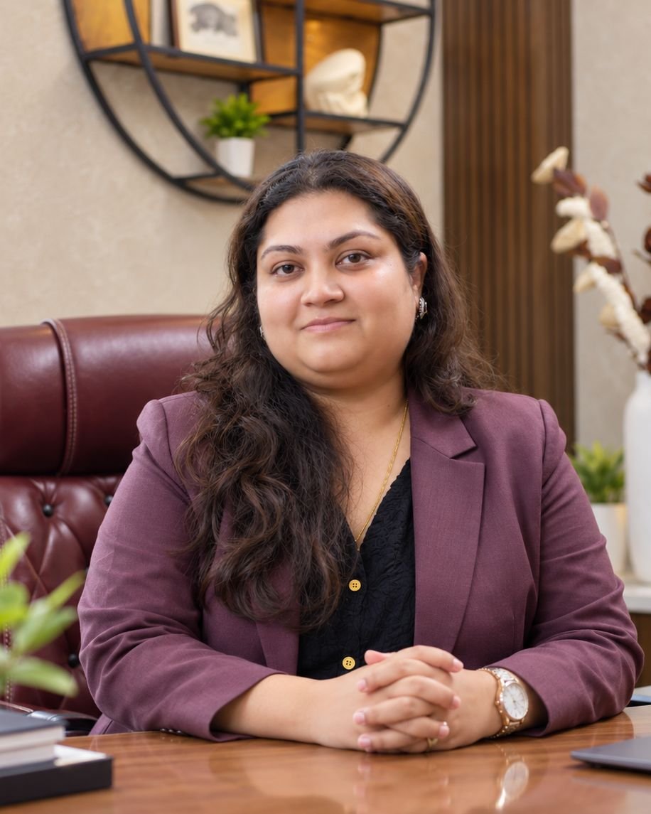 Dr. Swikriti Raniwala, plastic surgeon in Gurugram, at her desk